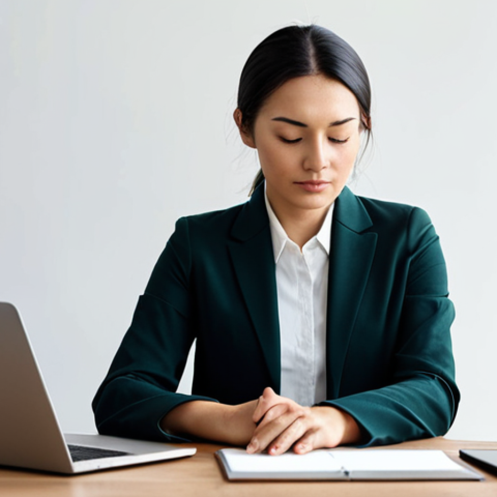 A professional woman in a modest business casual attire, sitting calmly at a modern home office desk with her eyes gently closed, engaged in a brief mindful breathing exercise. A laptop and a phone are subtly visible on the desk, not actively distracting. The well-lit, minimalist home office features a touch of greenery, signifying a calm and focused environment. fully clothed, modest clothing, appropriate attire, professional dress, safe for work, appropriate content, family-friendly, perfect anatomy, correct proportions, natural pose, well-formed hands, proper finger count, natural body proportions, high-resolution, professional photography, studio lighting, sharp focus.